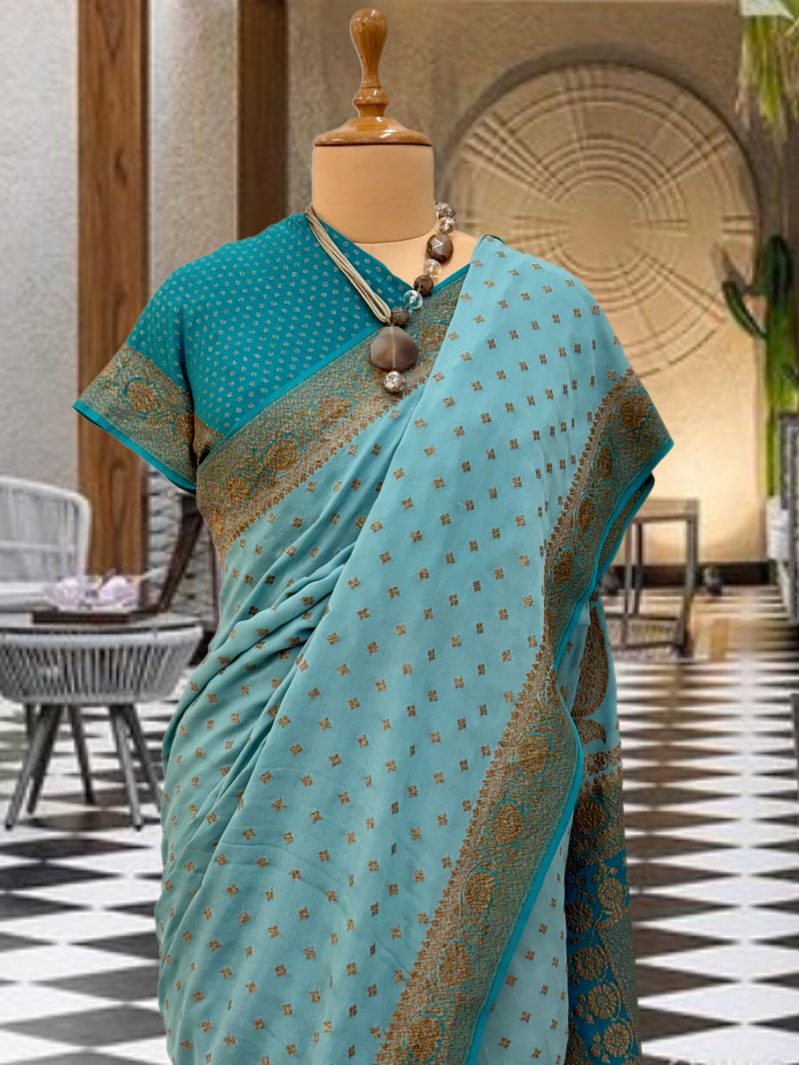 Kakatiya turquoise Chinon Crepe Saree