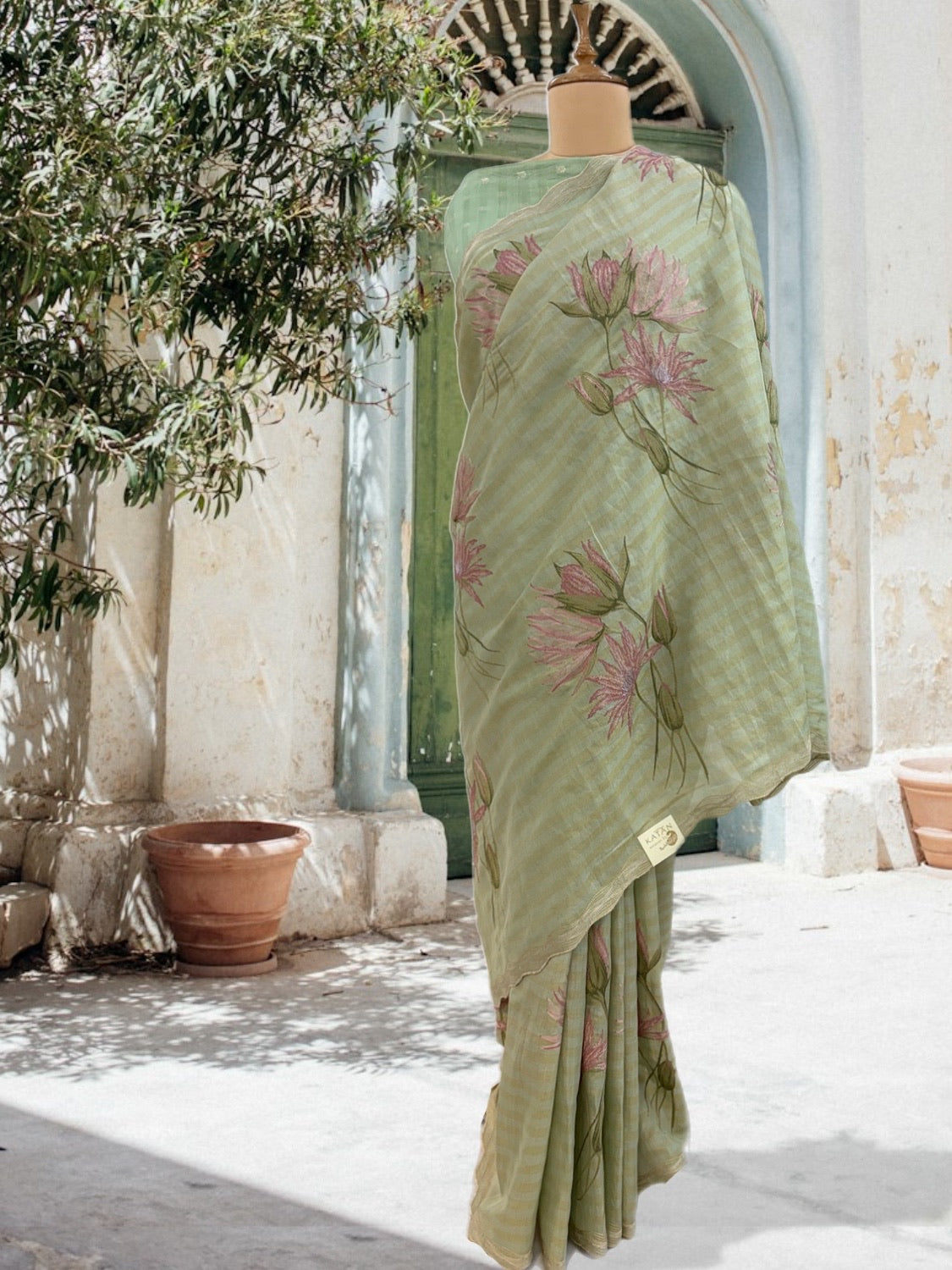 Swirling Lotus Green Embroidered Saree